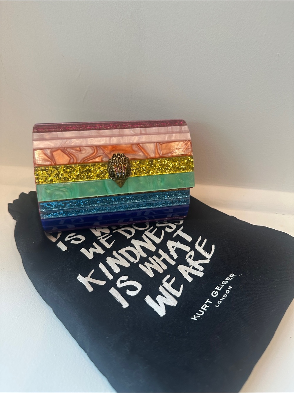 Kurt Geiger Rainbow Multicolor Acrylic Stripe Clutch with Gold Hamsa Clasp